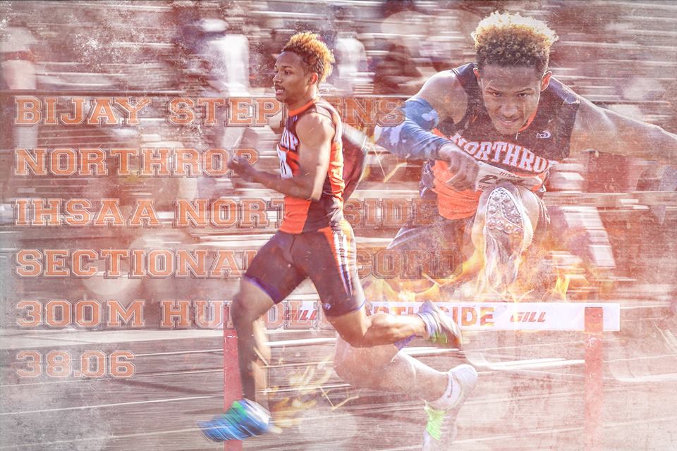 Two young runners racing on a track during a competition.