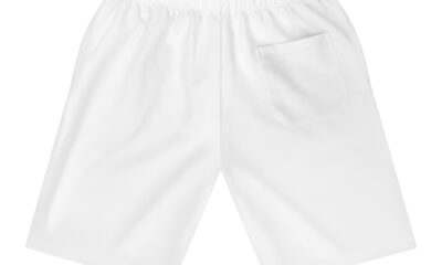 Plain white athletic shorts with elastic waistband.