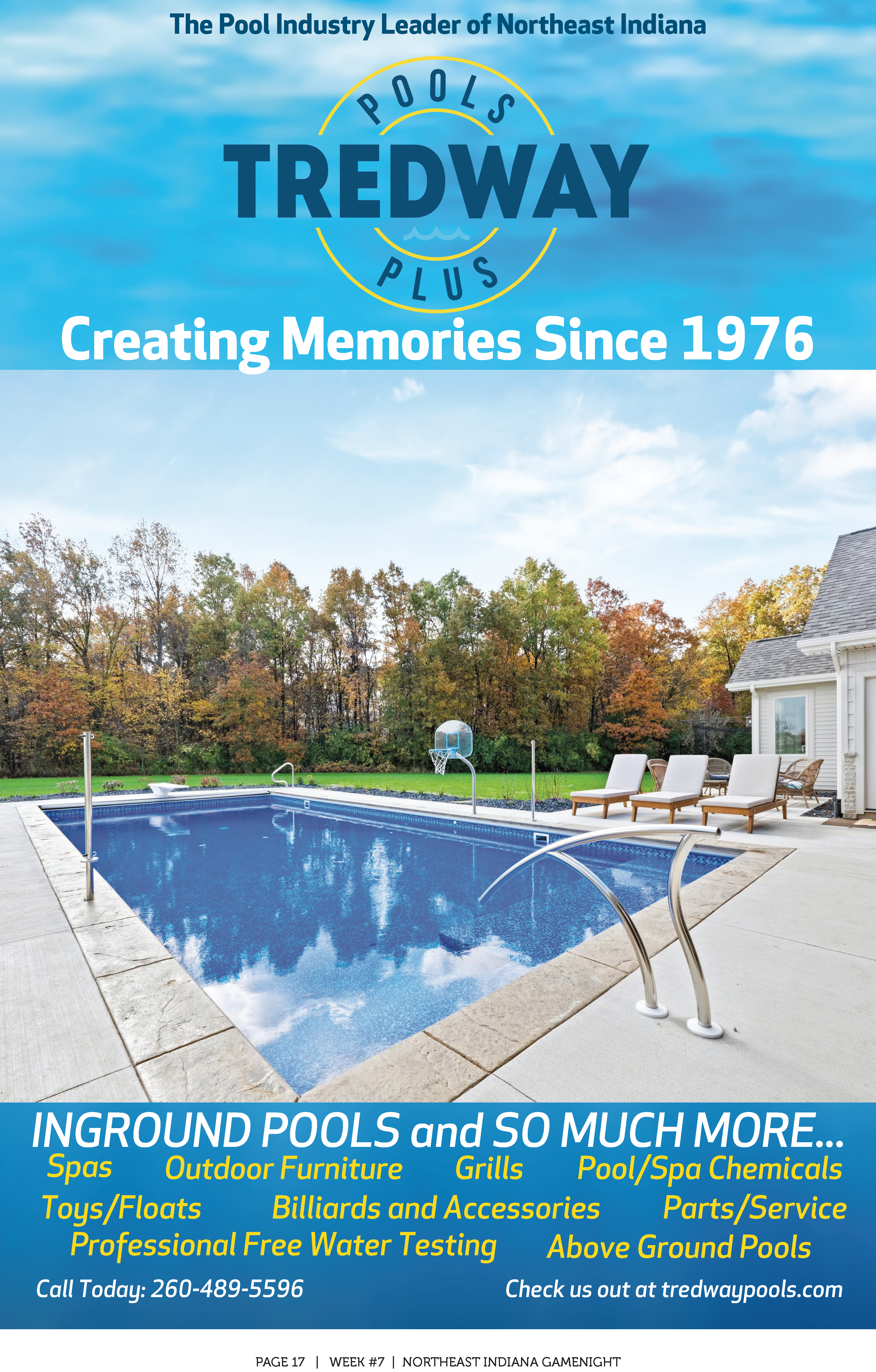 A serene backyard with a blue swimming pool surrounded by lounge chairs and autumn trees.