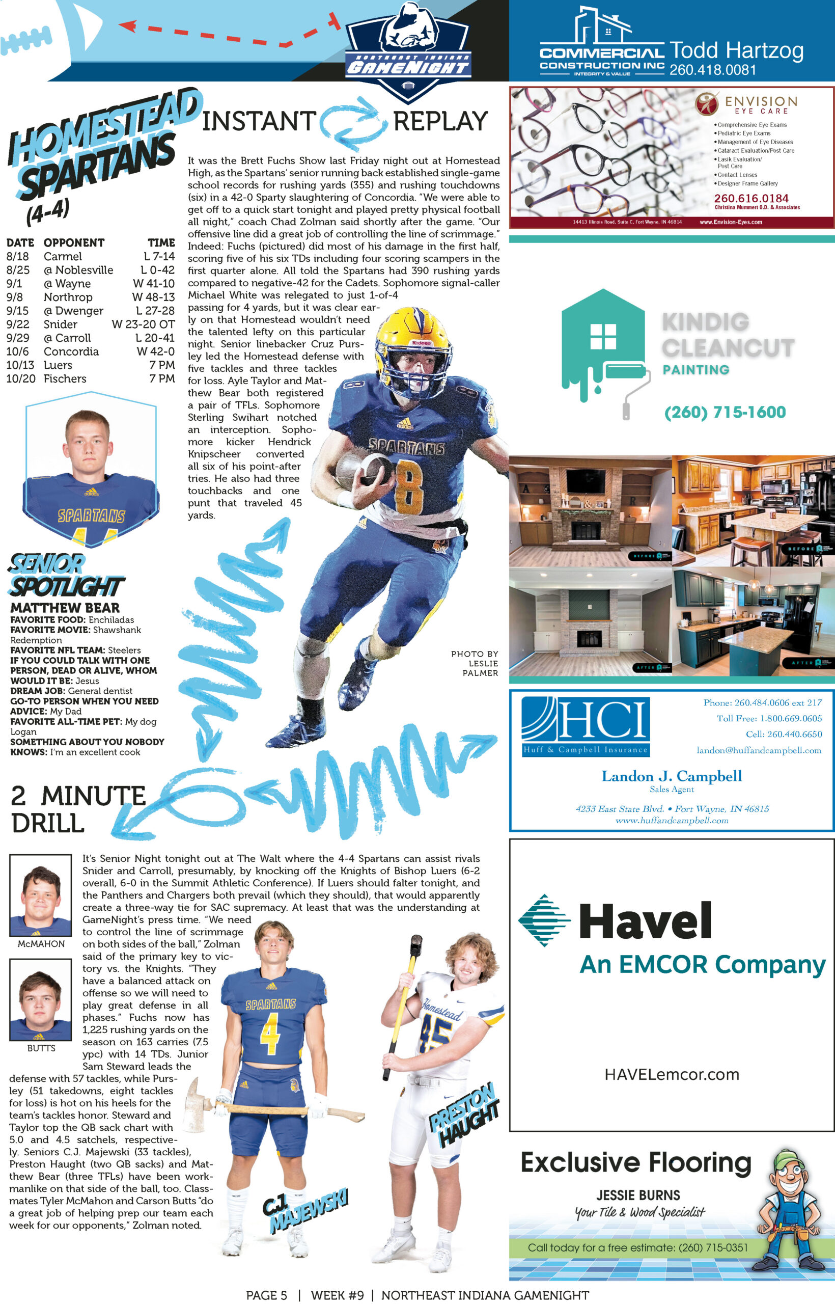 High school football player in blue and yellow uniform carrying the ball.