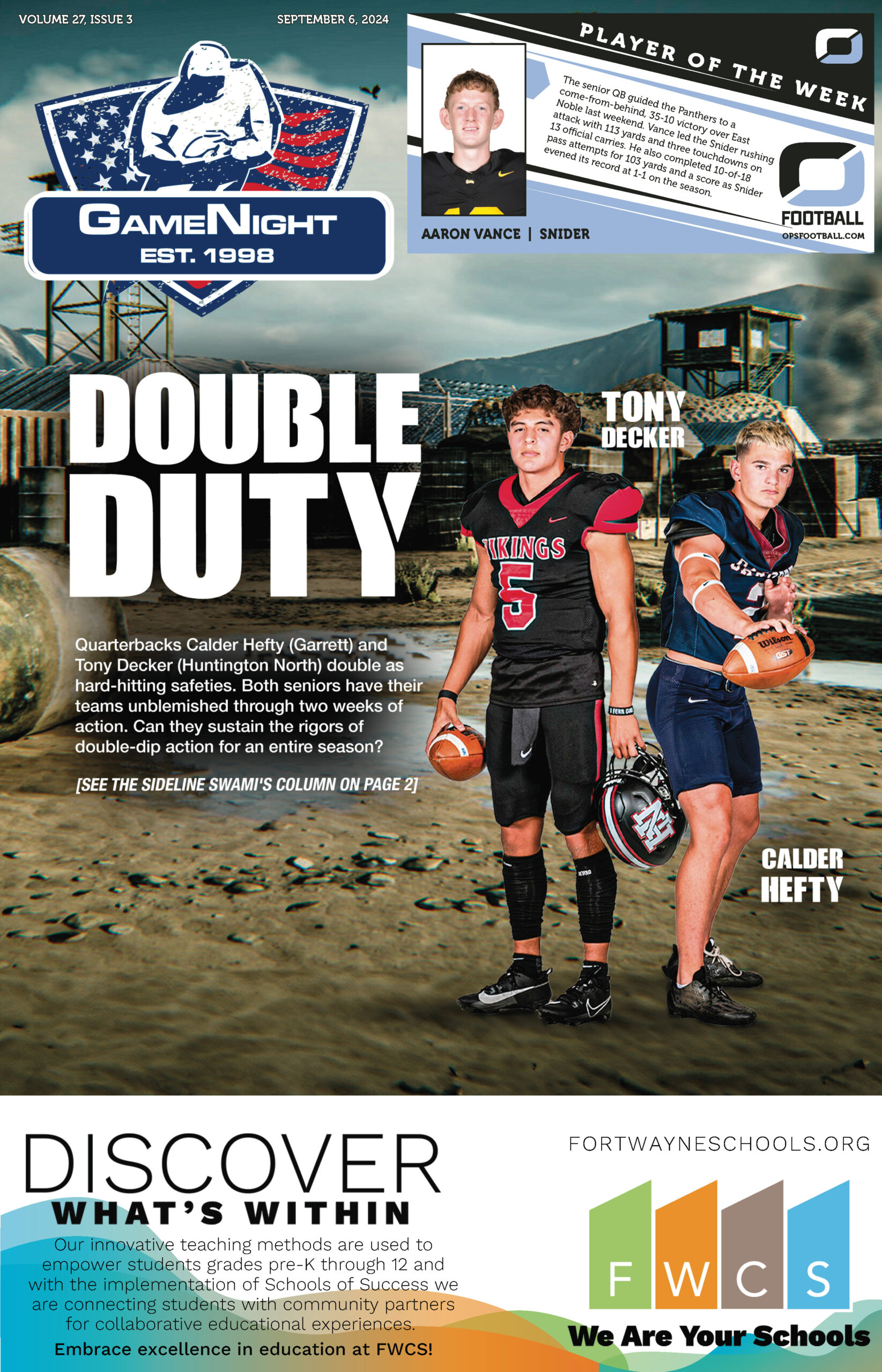 Two high school football players standing side by side on a field.