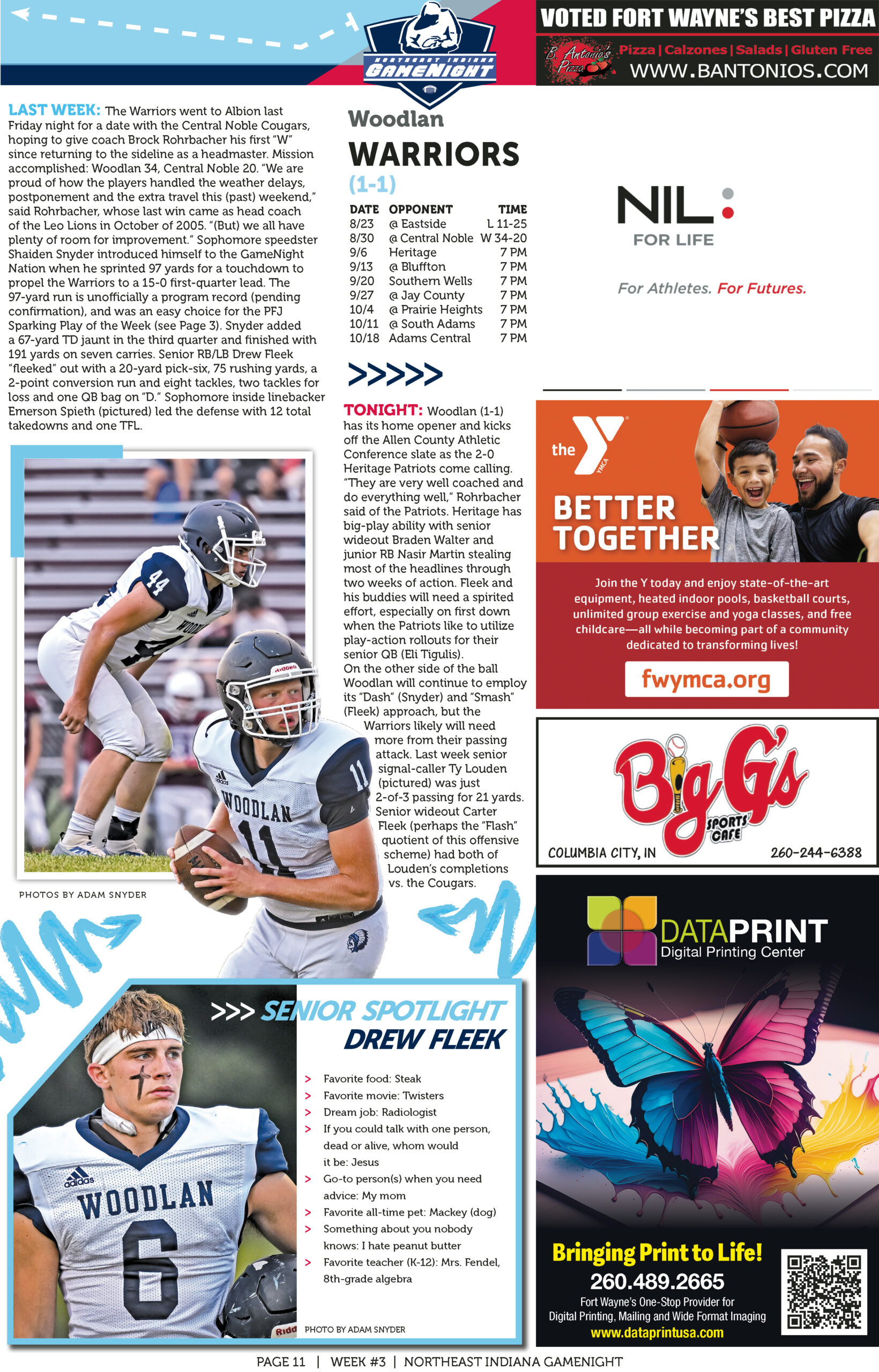 A football player catching a pass during a game, with teammates and crowd in the background.