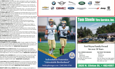 Two lacrosse players in white and green uniforms compete on the field during a game.